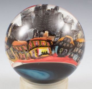for one handmade glass marble this gorgeous piece has a city scape set