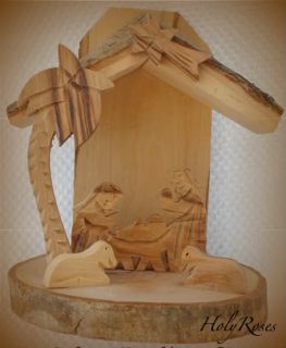 This is a beautiful small standing Christmas Creche/Nativity with bark
