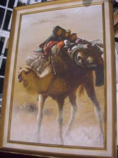 Bedouin Mother and Child Riding A Camel