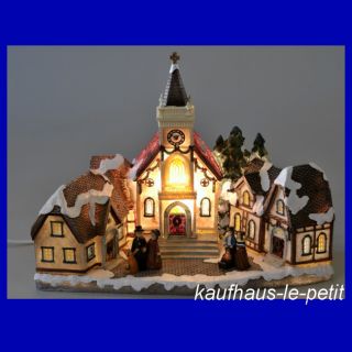 Winterdorf beleuchtet Weihnachtsdorf Kirche Dorfkiche Haus Haeuser