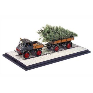 03119   Schuco   MB Unimog und Anhänger mit Weihnachtsbaum und