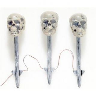 Solar Powered Light Up Skull Lawn Stakes Clothing